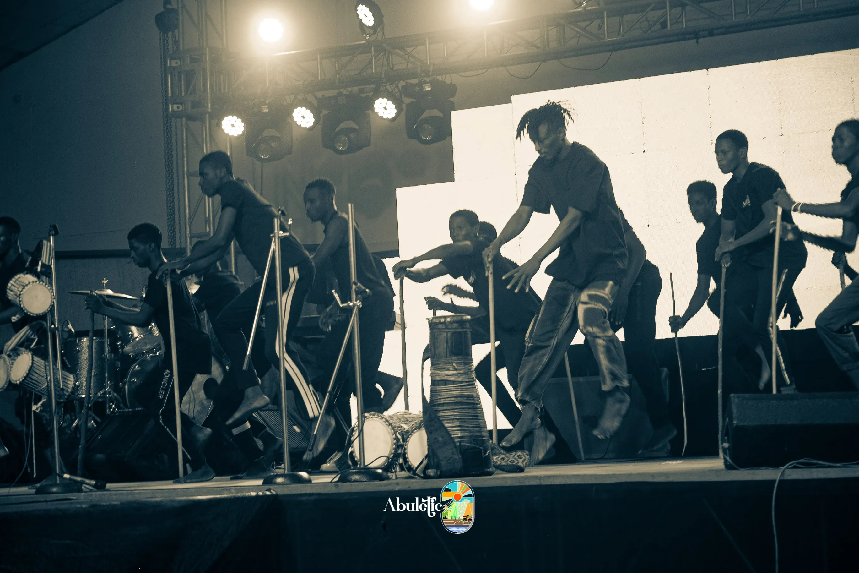 Dancers in silhouette on the lit stage, Ibadan 2022