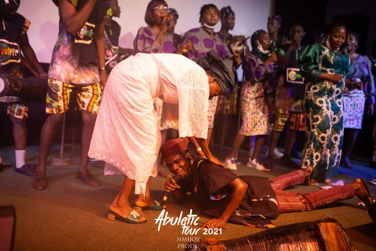 A full prostration, the Yoruba greeting for an elder