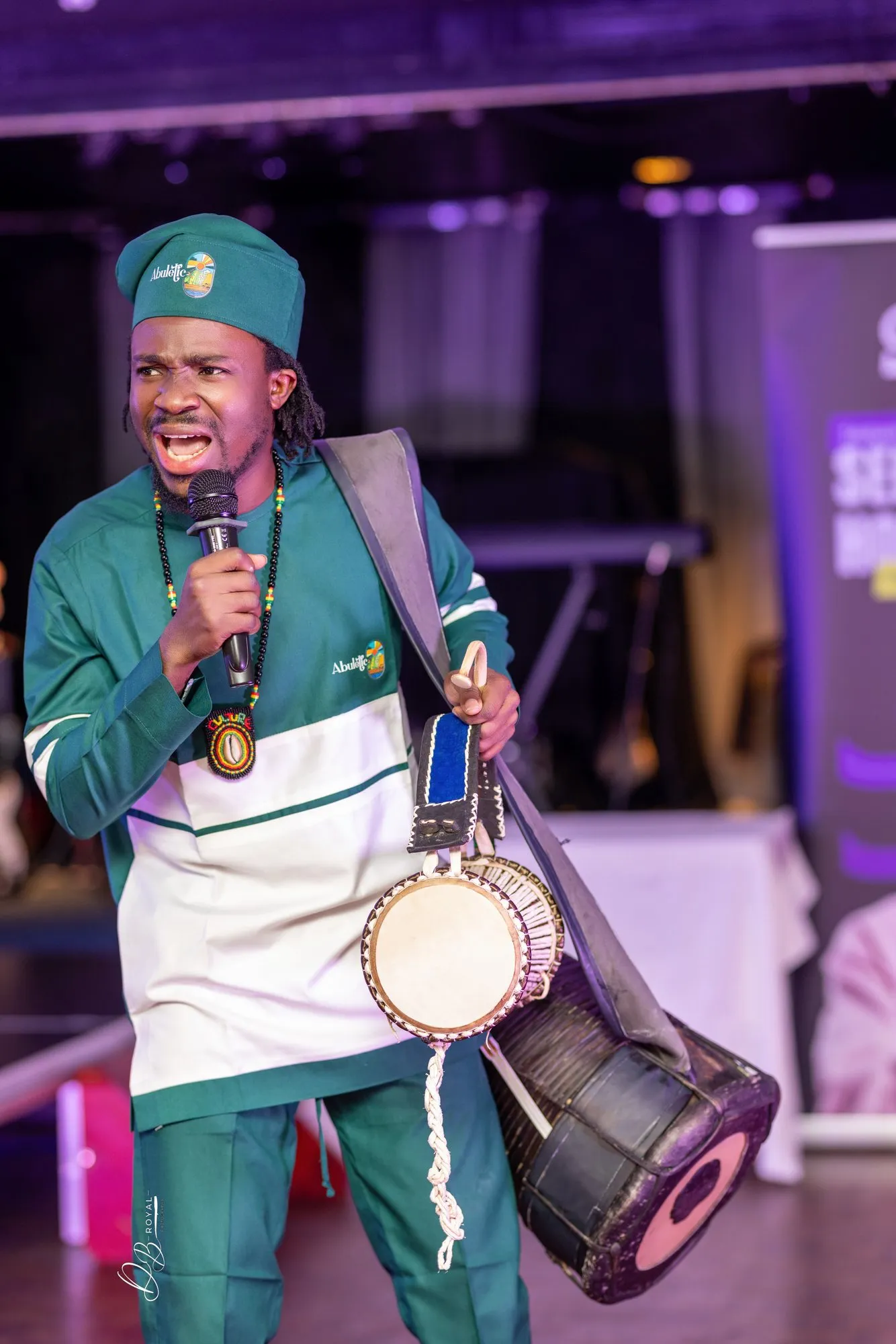 The Abuletic King with the dùndún and the microphone