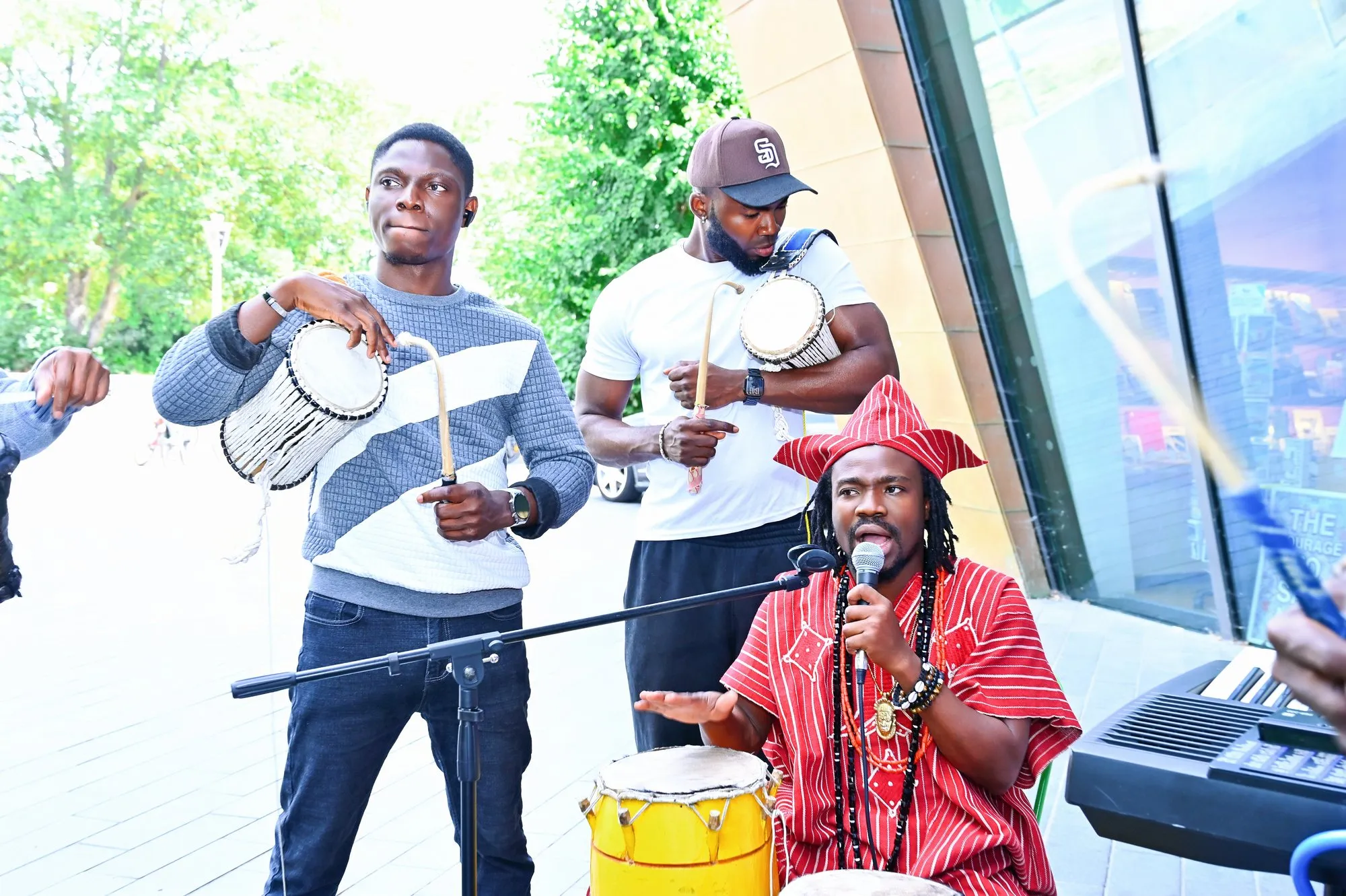 Singing with the drummers in front of Firstsite