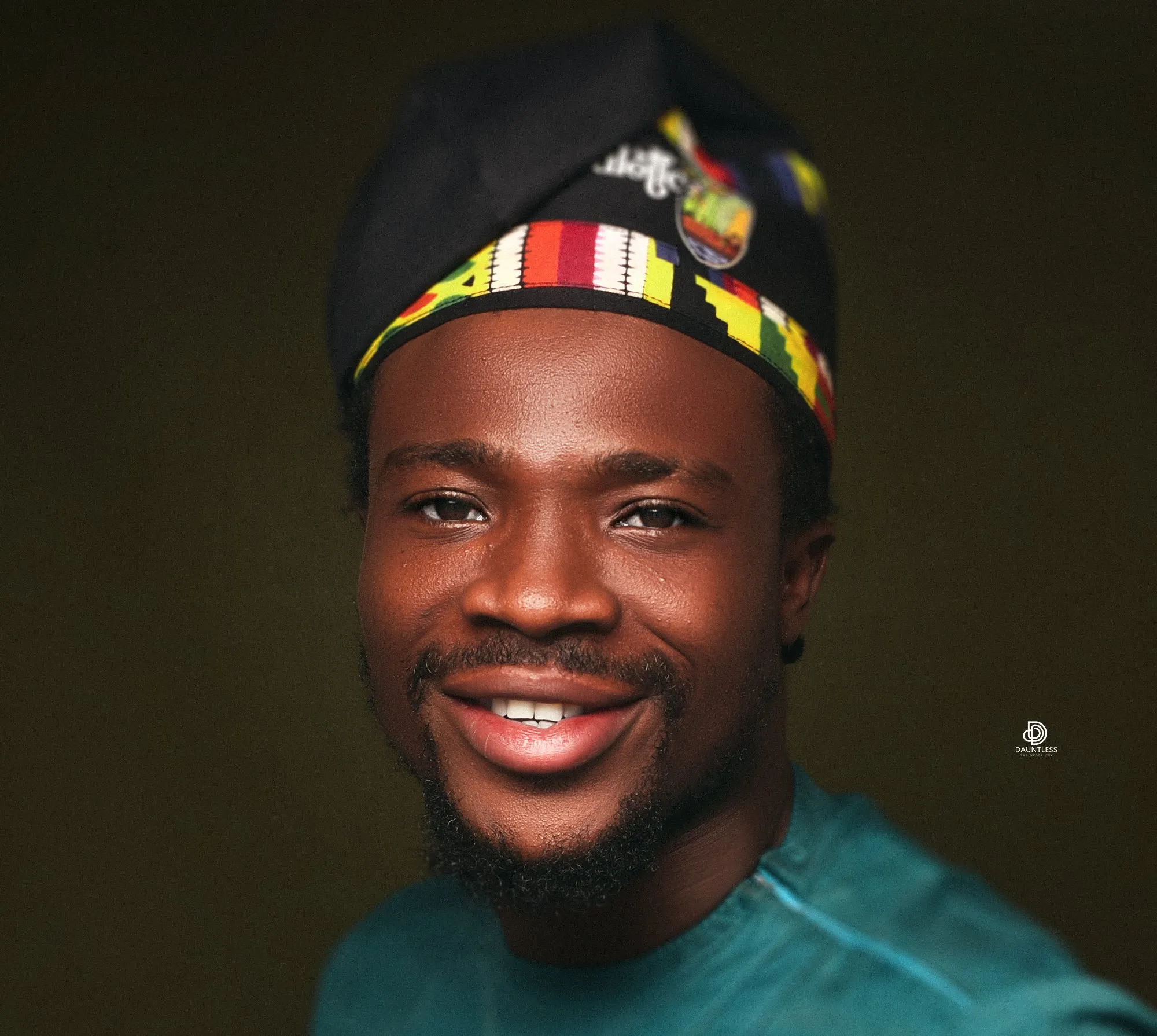 Portrait of the Abuletic King in a kente cap